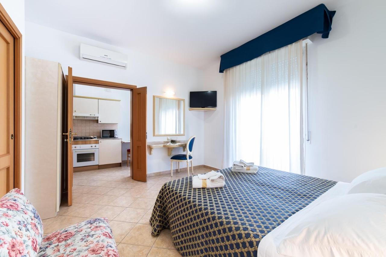 Residenza Melucci Aparthotel Rimini Bagian luar foto
