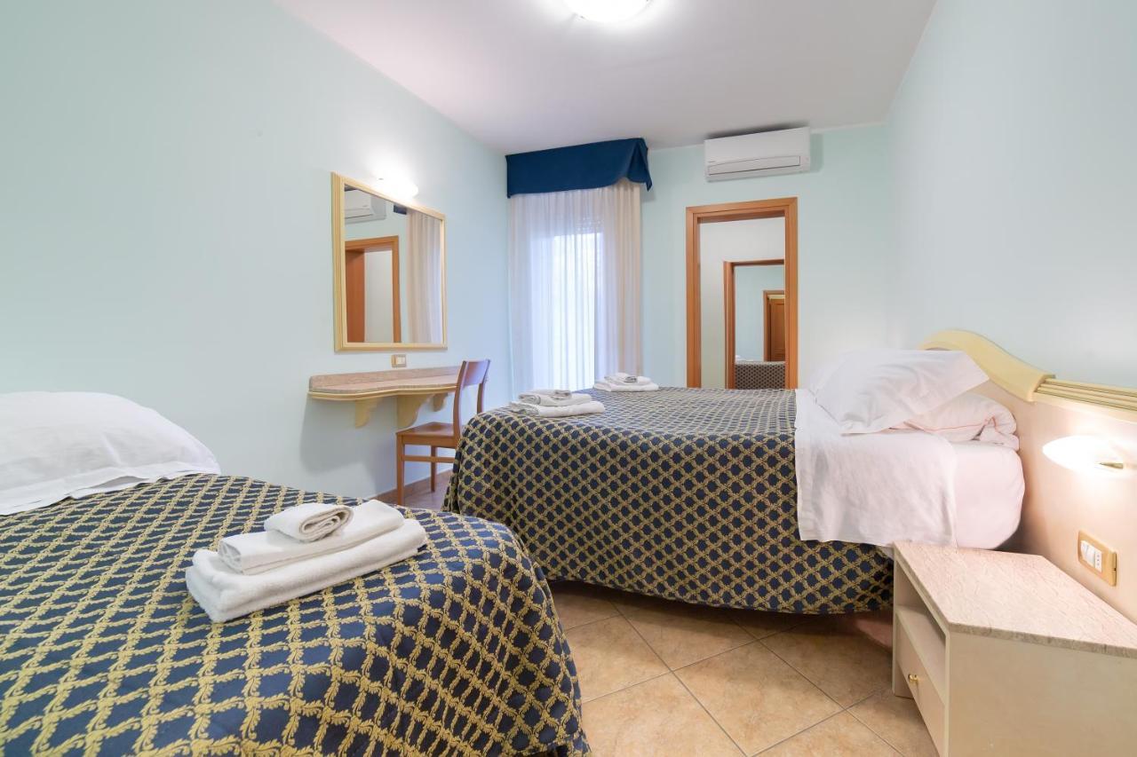 Residenza Melucci Aparthotel Rimini Bagian luar foto