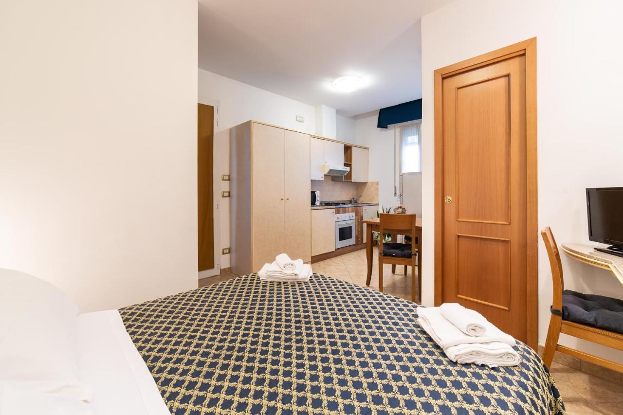 Residenza Melucci Aparthotel Rimini Bagian luar foto
