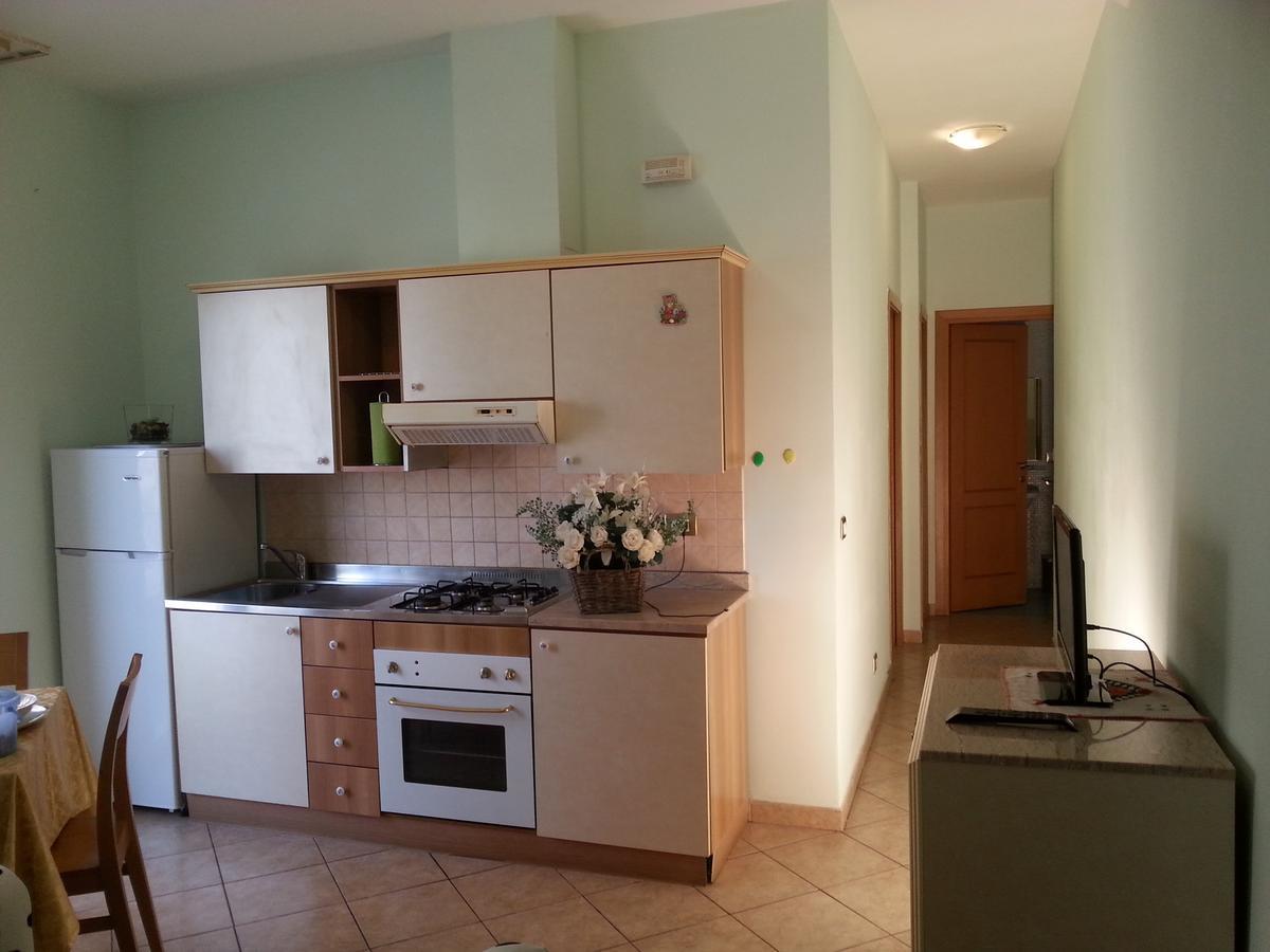 Residenza Melucci Aparthotel Rimini Bagian luar foto